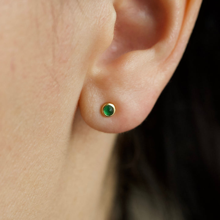 Dainty emerald stud earrings