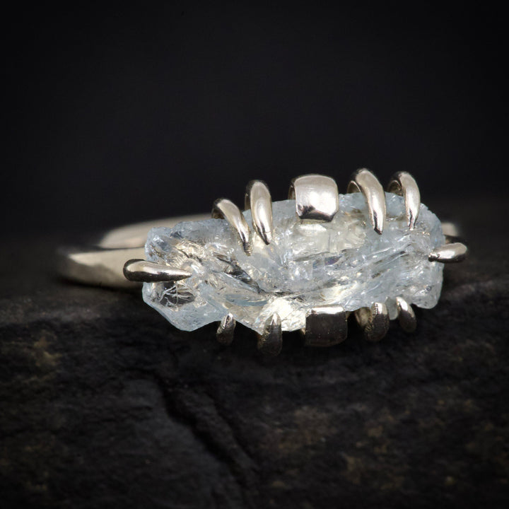 Ring with a big raw aquamarine crystal